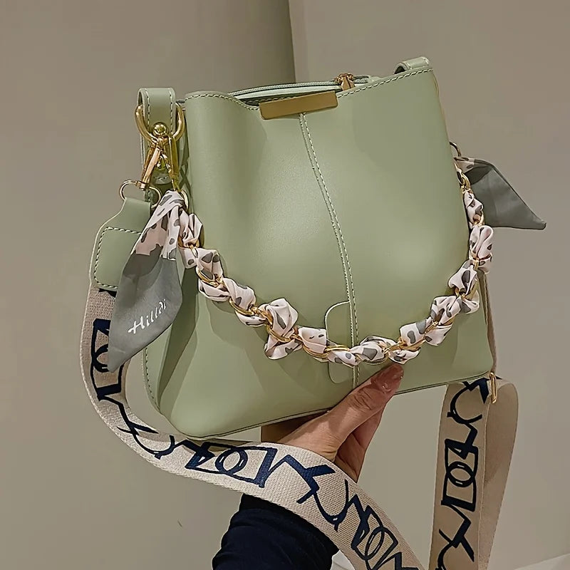 Bolsa Bucket Ribbon Chain – Elegância Feminina com Espaço e Versatilidade