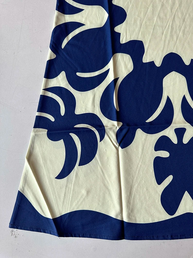 Vestido Midi Estampado com Decote V e Saia Fluida