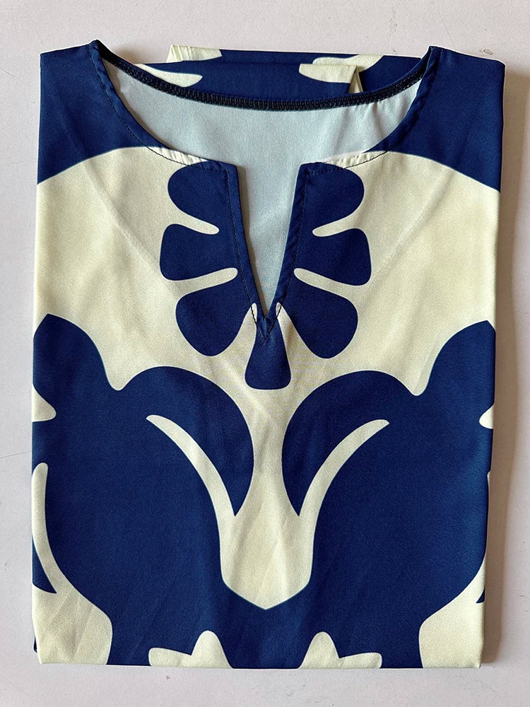 Vestido Midi Estampado com Decote V e Saia Fluida